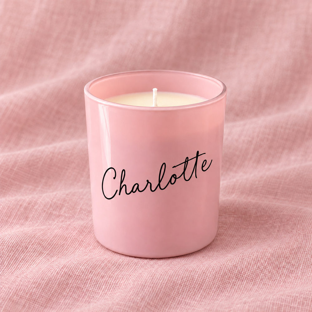 Pink personalised bridesmaid candle with the name Charlotte in black lettering