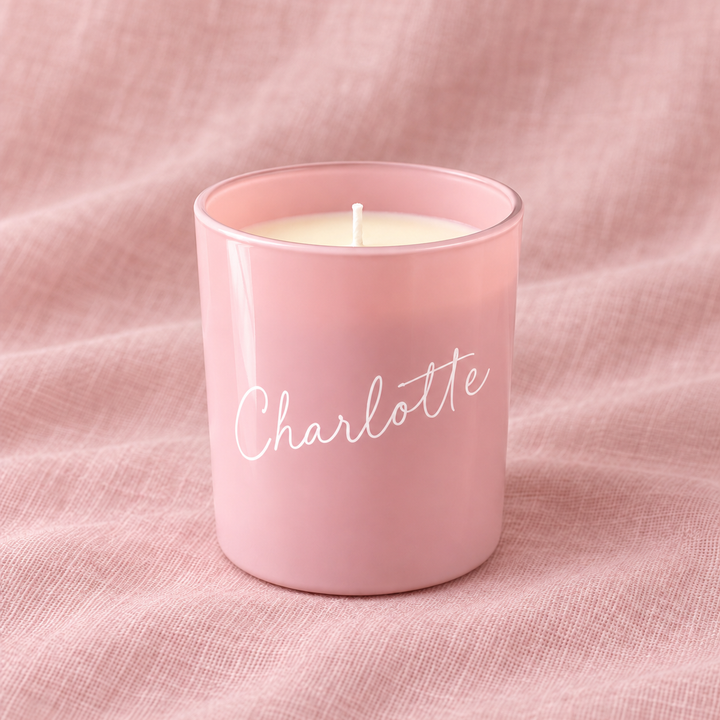 Pink personalised bridesmaid candle with the name Charlotte in script lettering