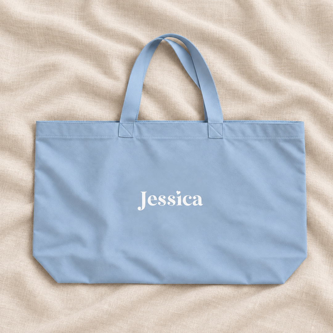 Dusty blue personalised bridesmaid XL tote bag with the name Jessica, on cream linen