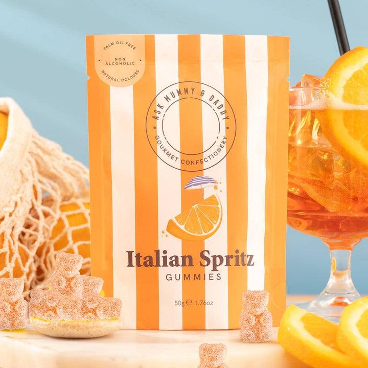 Italian Spritz gummies packaging with oranges and a glass of spritz on a blue background
