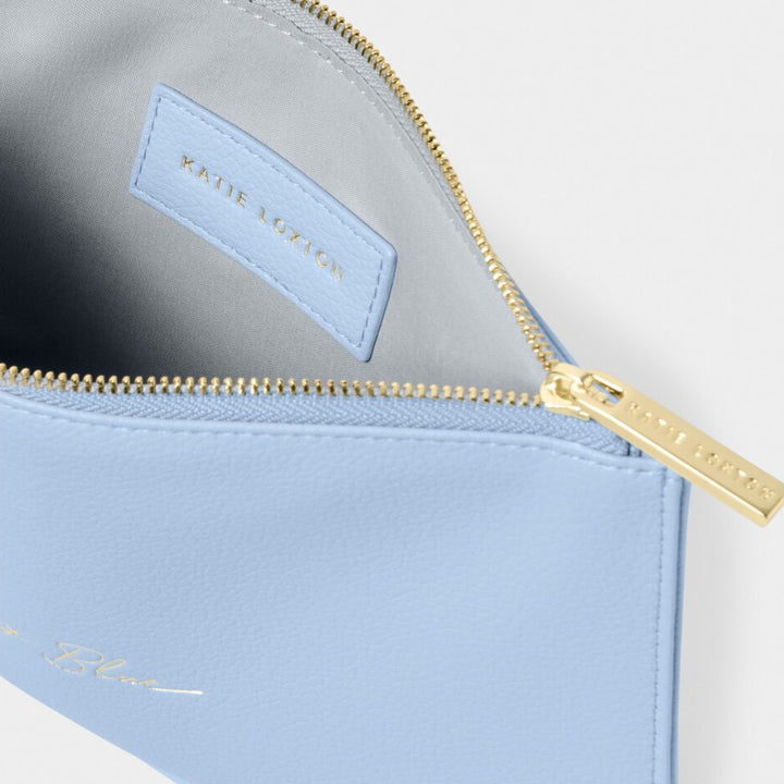 Light blue pouch with gold zipper on a white background