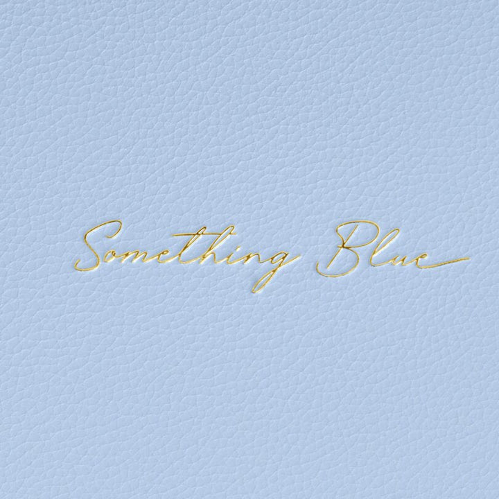 Light blue fabric with 'Something Blue' embroidery in gold thread