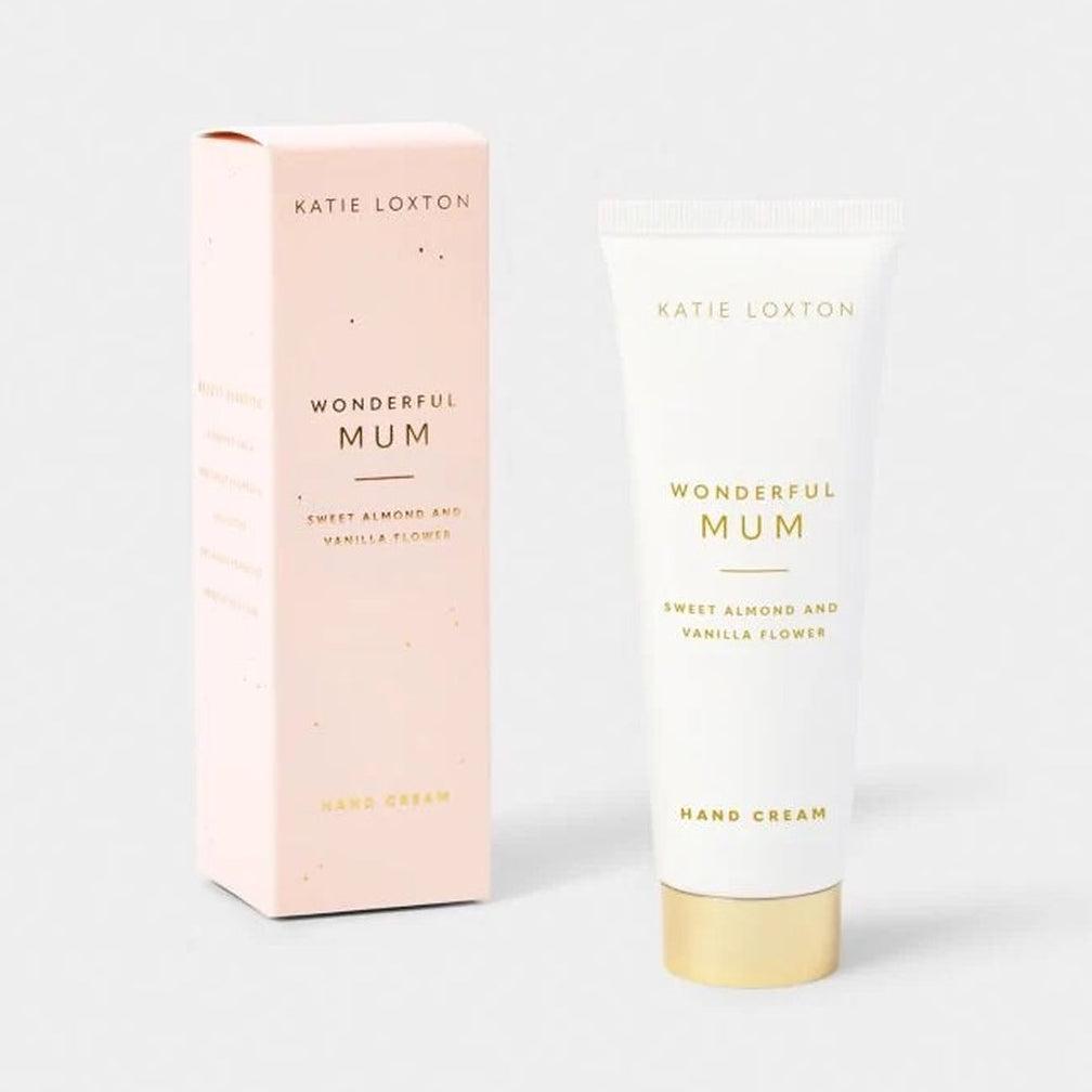 Katie Loxton Wonderful Mum hand cream in a white squeeze tube with a gold cap, standing next to its light pink packaging box on a clean white background.